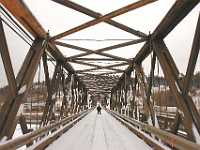 cameron street bridge walker 2005  cameron street bridge walker in thursday dave milne dec 7 05 A lone pedestrian treks across the condemned Cameron Street Bridge Wednesday. The bridge which used to carry thousands of cars and trucks daily is now a pedestrian crossing of the Nechako River. Mayor Colin Kinsley has promised a replacement for the bridge is at the top of his to-do list.